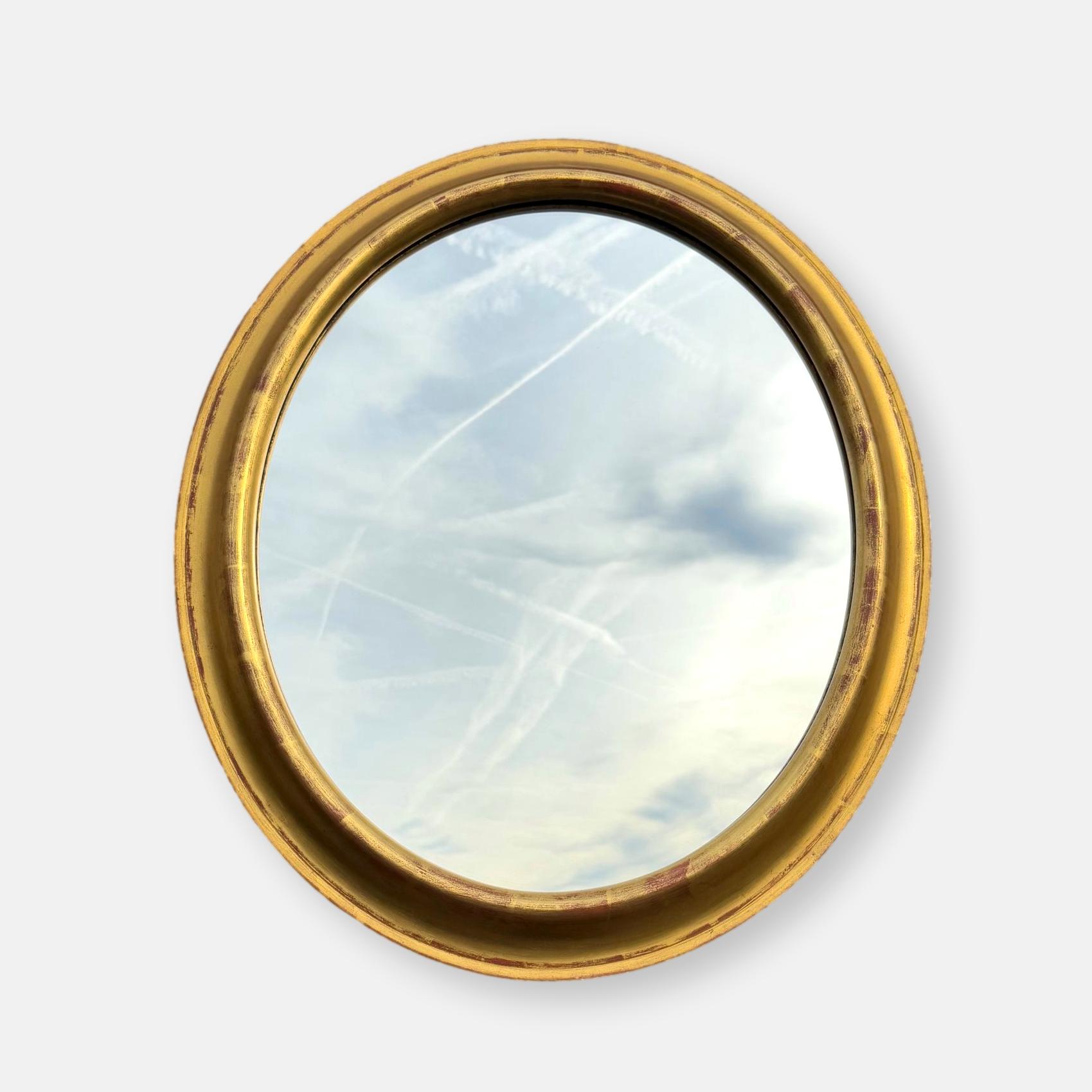 Vintage oval mirror with gold wooden frame