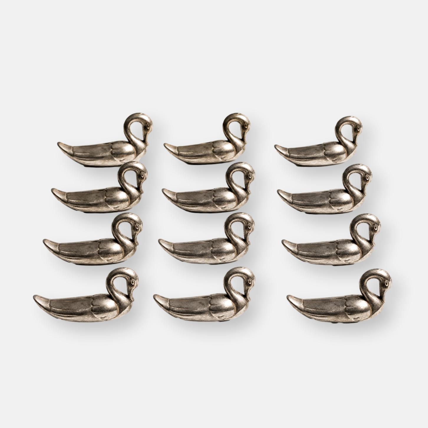 Série de 12 porte-couteaux cygnes