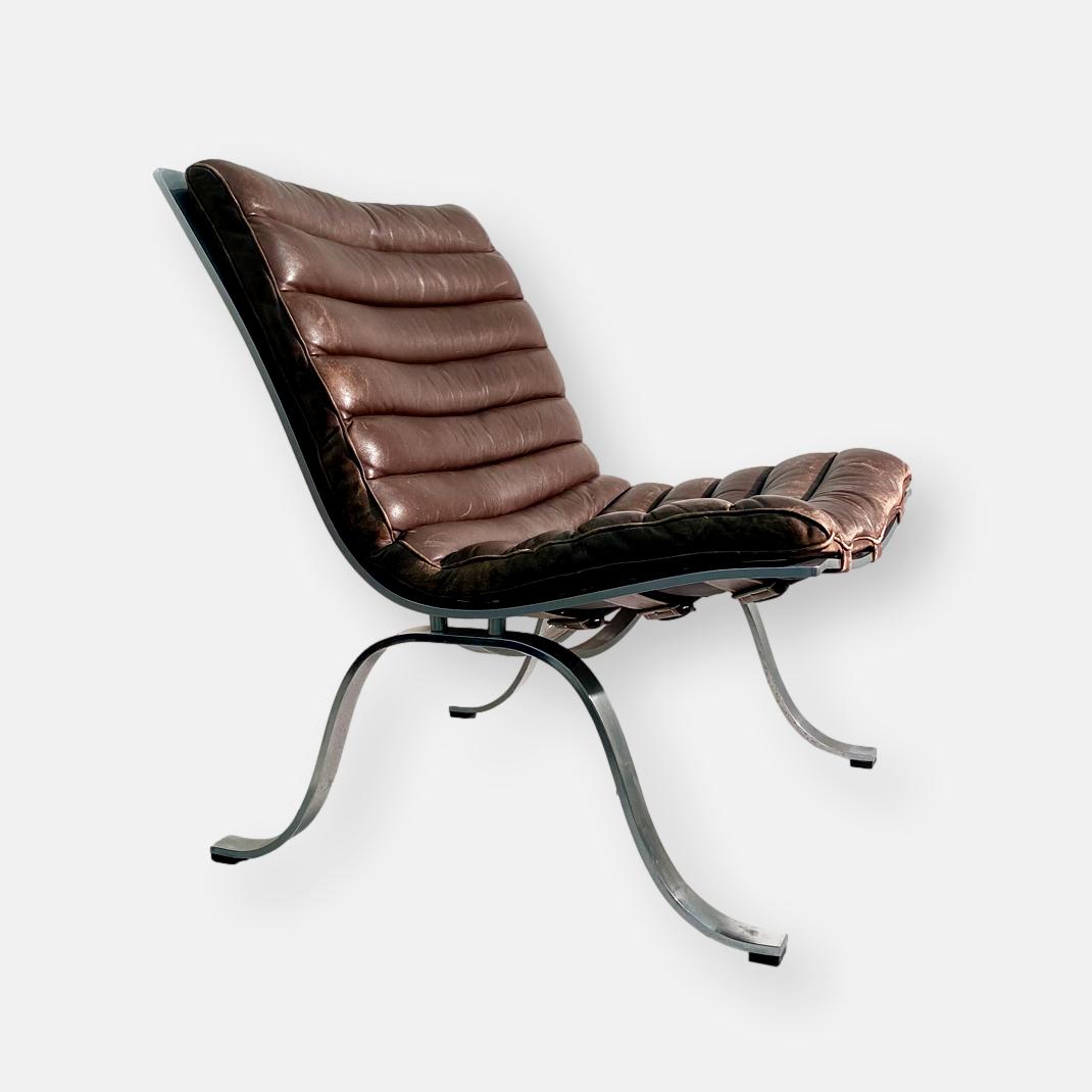 Fauteuil « Ari » d'Arne Norell en cuir et métal